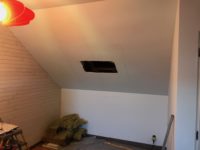 Pose d'une fenêtre de toit Velux en sous-pente chez un particulier